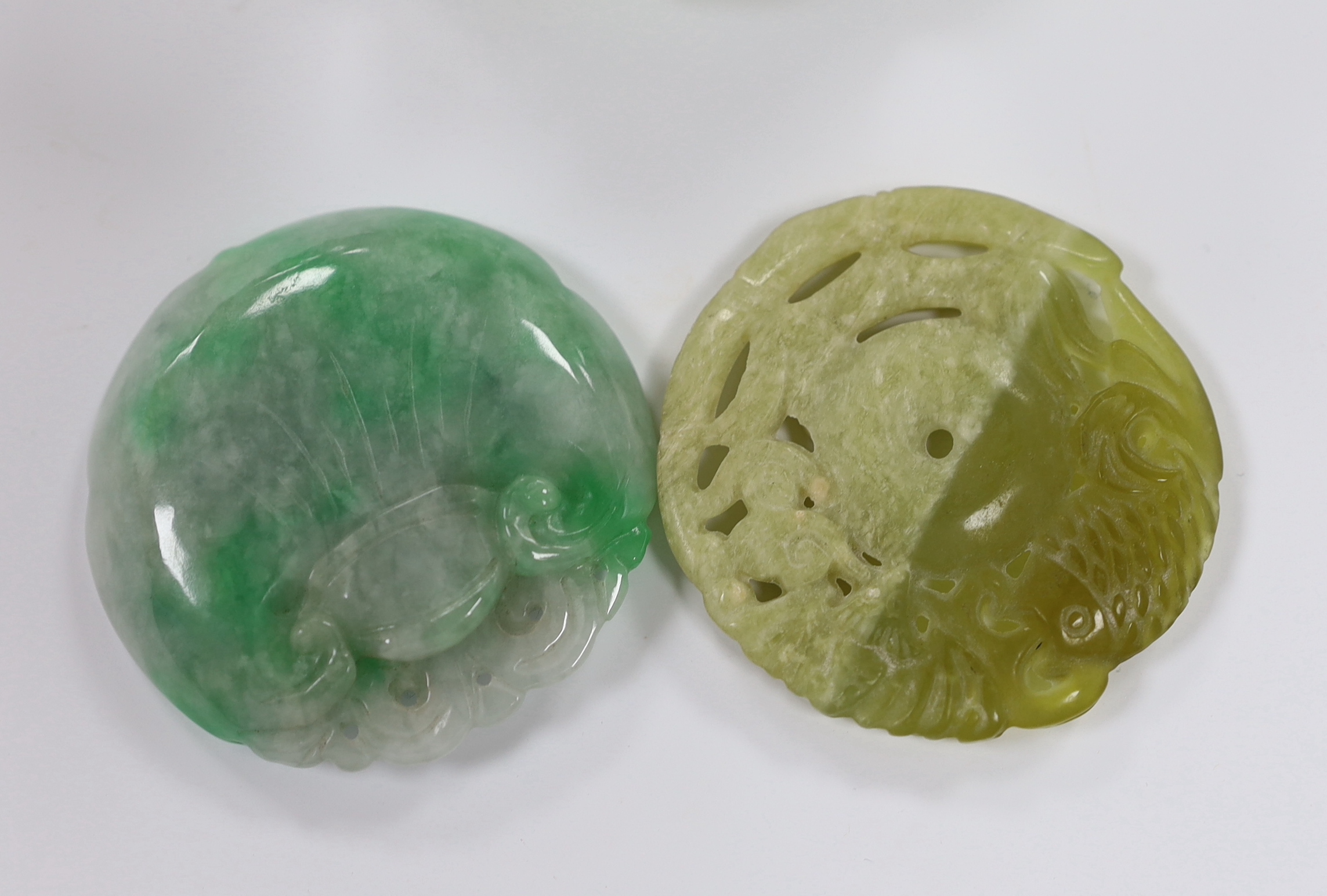 A collection of Chinese jades, etc including a carved disc, largest 11cm wide